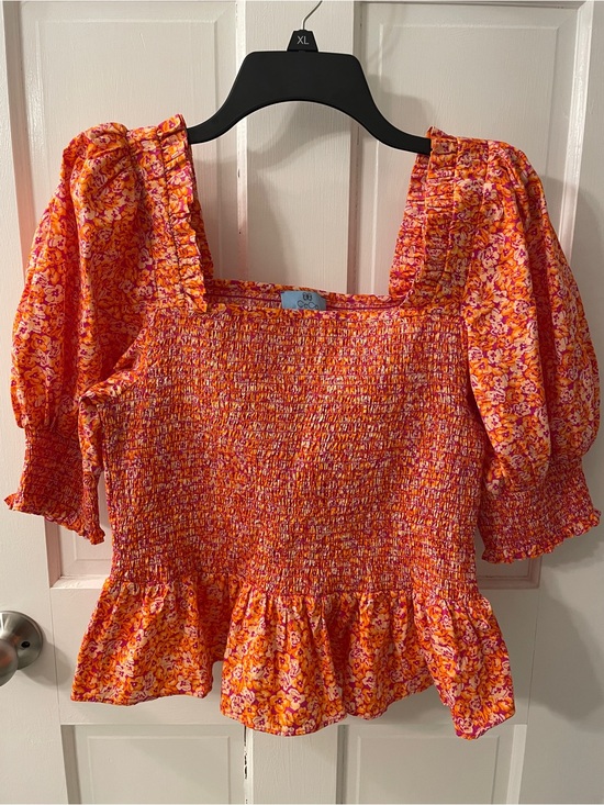CeCe Tops - NWOT CeCe Smocked Floral Peplum Top